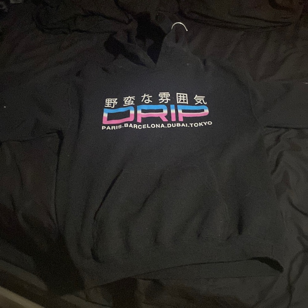 black hoodie with blue and purple graphics